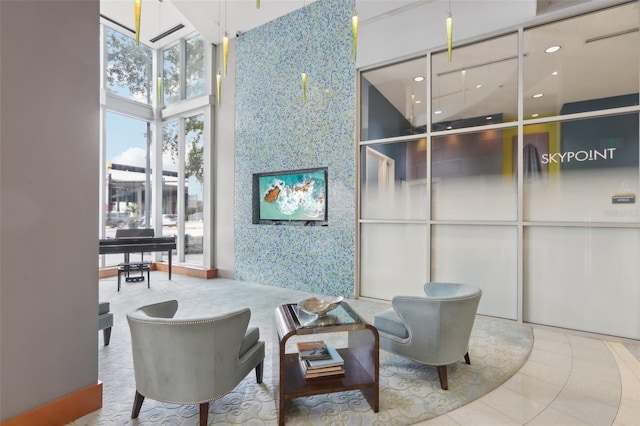 777 N Ashley Dr Unit 1606, Tampa, FL 33602 - community lobby featuring wallpapered walls and a high ceiling