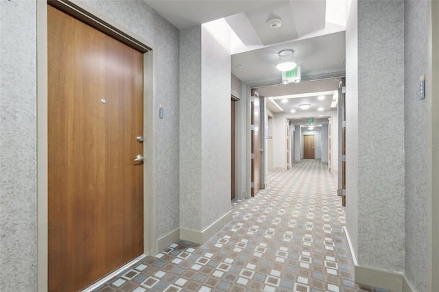 777 N Ashley Dr Unit 1606, Tampa, FL 33602 - corridor featuring baseboards