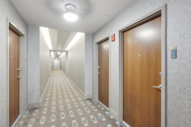 777 N Ashley Dr Unit 1606, Tampa, FL 33602 - corridor featuring baseboards