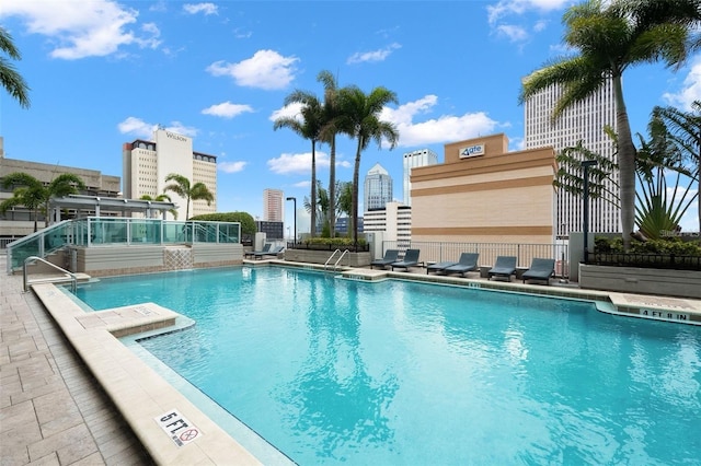 view of swimming pool featuring a patio area