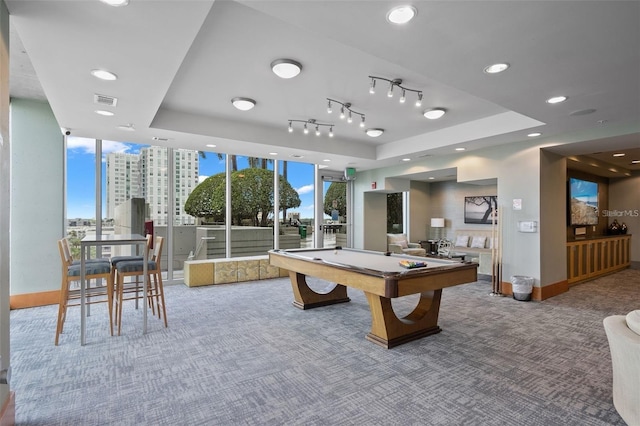 rec room with carpet flooring, a raised ceiling, and pool table