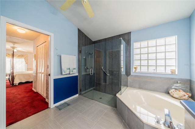 bathroom with ceiling fan, shower with separate bathtub, and tile patterned floors