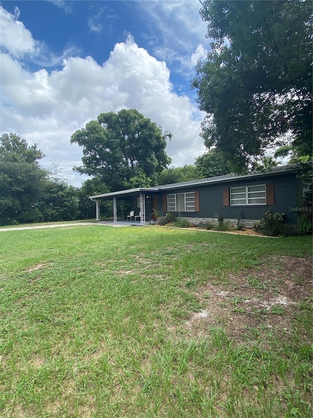 exterior space featuring a lawn