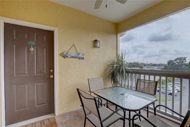 exterior space featuring ceiling fan