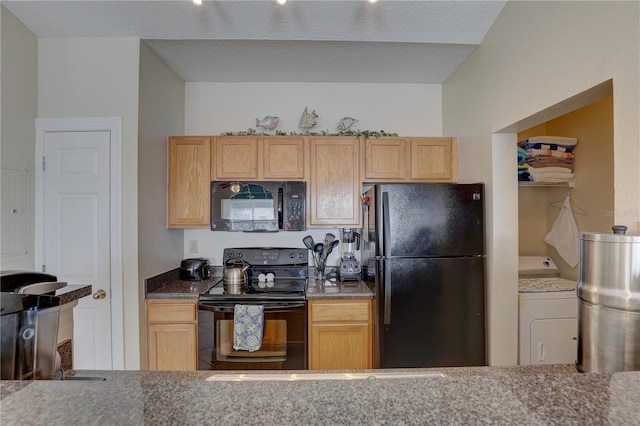 kitchen featuring a textured ceiling, black appliances, washer / clothes dryer, and light brown cabinets