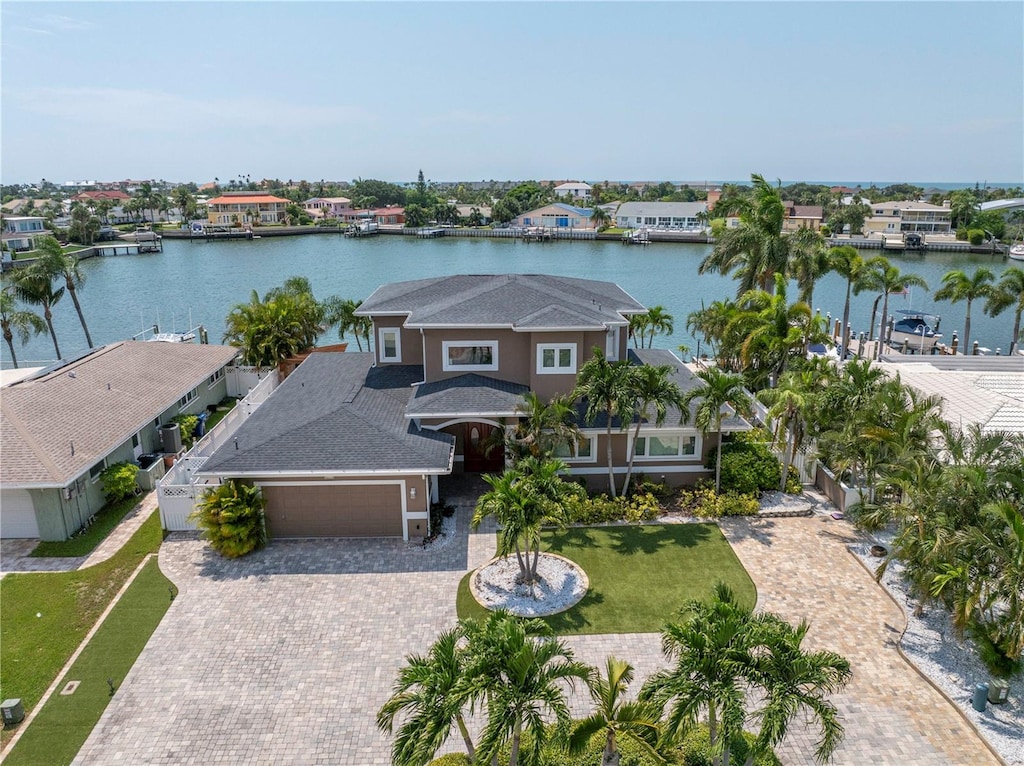 bird's eye view with a water view