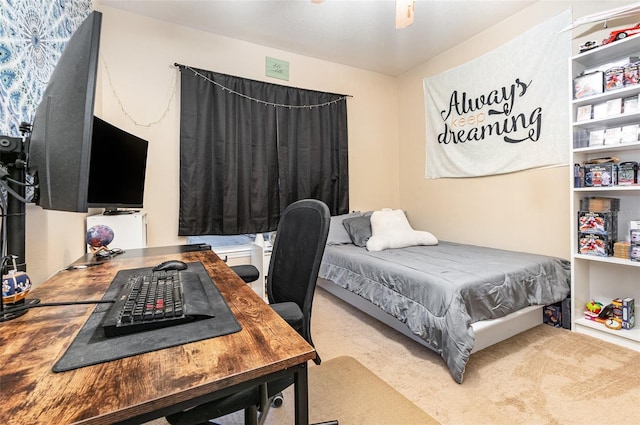 bedroom featuring ceiling fan and light colored carpet