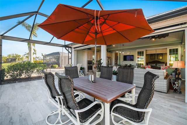 view of patio / terrace with a lanai