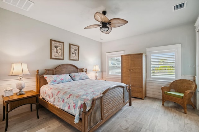 bedroom featuring ceiling fan and light hardwood / wood-style flooring