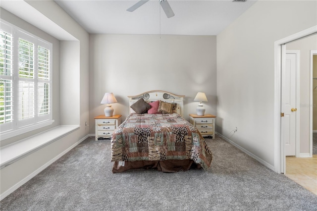 carpeted bedroom with ceiling fan