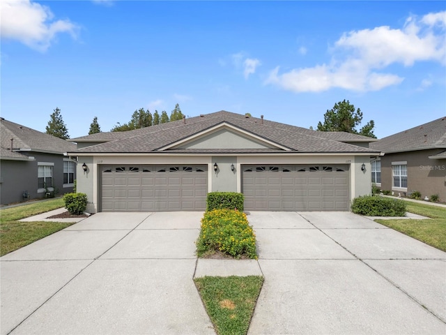 ranch-style home with a garage