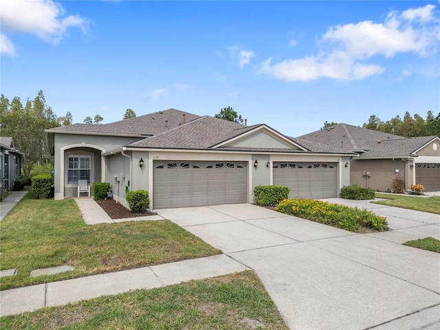 single story home with a front yard and a garage