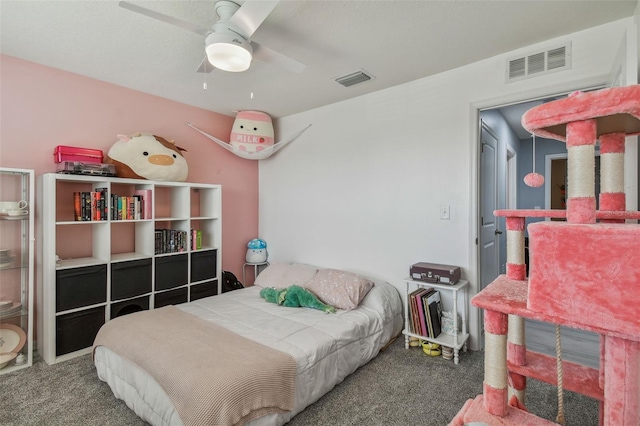 carpeted bedroom featuring ceiling fan and visible vents