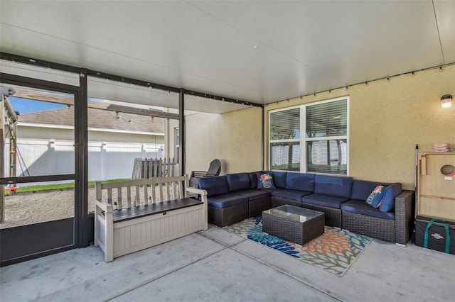 sunroom / solarium featuring a wealth of natural light