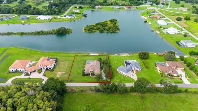 birds eye view of property featuring a water view