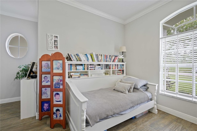 bedroom featuring wood-type flooring and crown molding