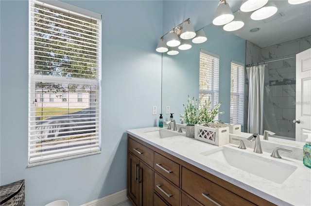 bathroom with vanity and shower / bathtub combination with curtain