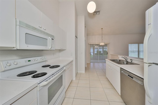 kitchen with white cabinetry and white appliances