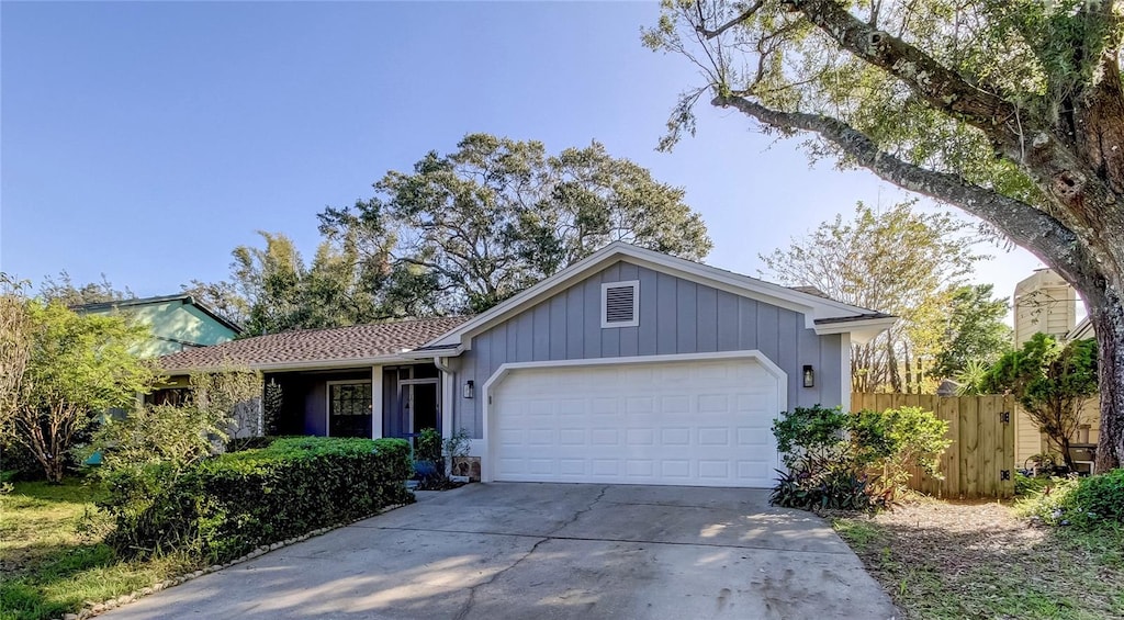 single story home featuring a garage