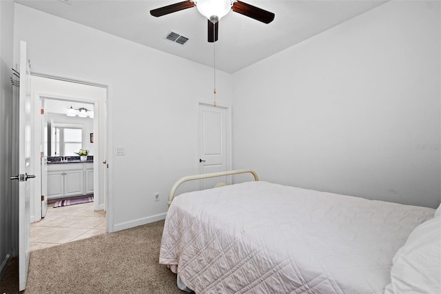 bedroom with light colored carpet and ceiling fan