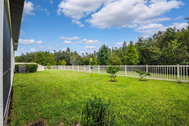 view of yard featuring central AC unit