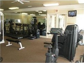 exercise room with ceiling fan