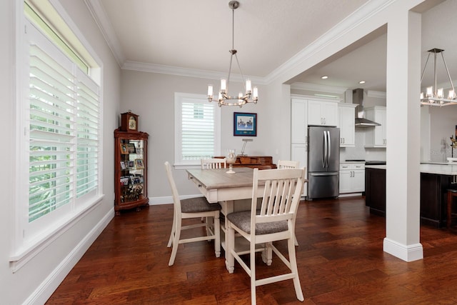 dining room featuring a notable chandelier, ornamental molding, dark wood-type flooring, and a wealth of natural light