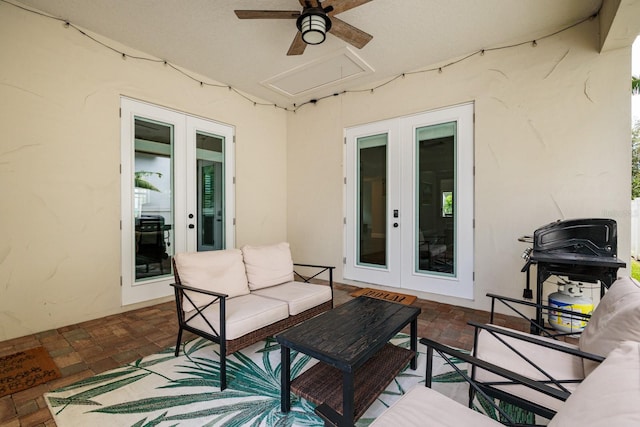 view of patio / terrace featuring french doors, ceiling fan, and outdoor lounge area