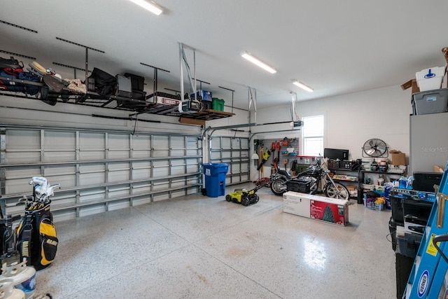 garage featuring a garage door opener