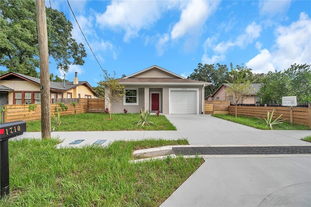 ranch-style home with a front yard and a garage