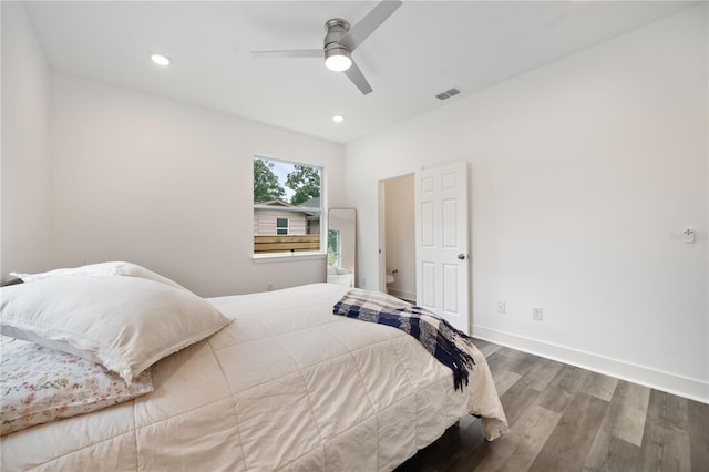 bedroom featuring ceiling fan and hardwood / wood-style floors