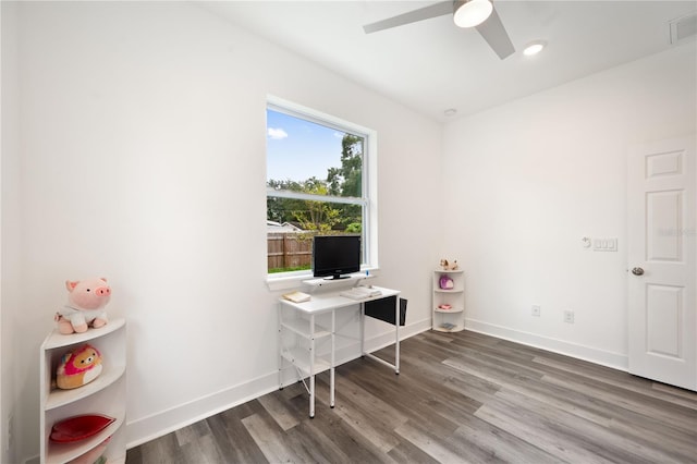 office area with ceiling fan and hardwood / wood-style floors