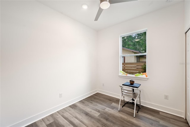 spare room featuring ceiling fan and hardwood / wood-style floors