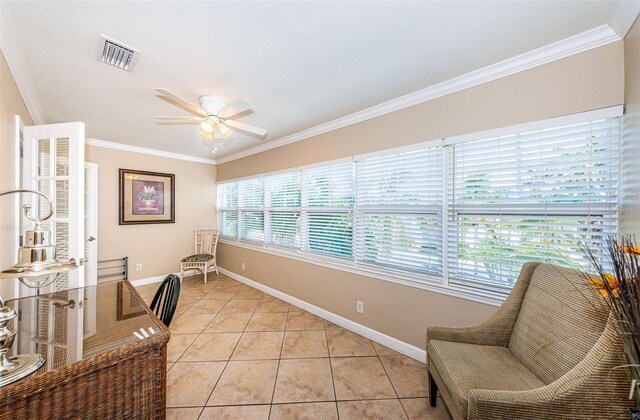 tiled office with ceiling fan, crown molding, and a wealth of natural light