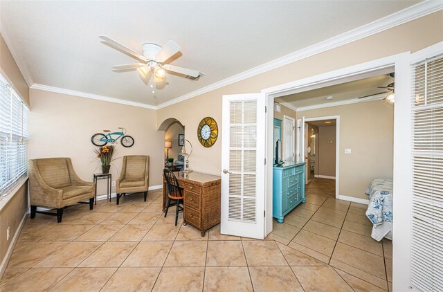 tiled office space with ornamental molding and ceiling fan