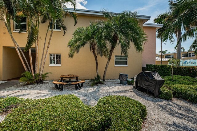 back of house with a patio area