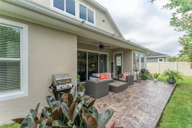 view of patio / terrace with outdoor lounge area, grilling area, and ceiling fan