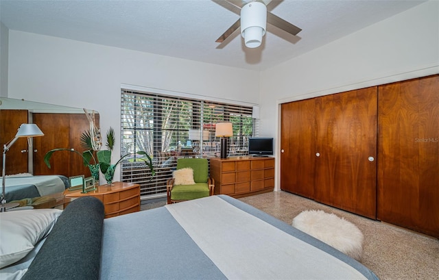 bedroom featuring ceiling fan and a closet