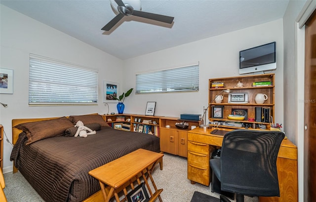 bedroom with ceiling fan and lofted ceiling