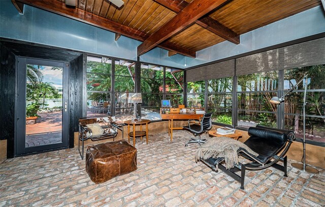 sunroom / solarium with wood ceiling and beamed ceiling