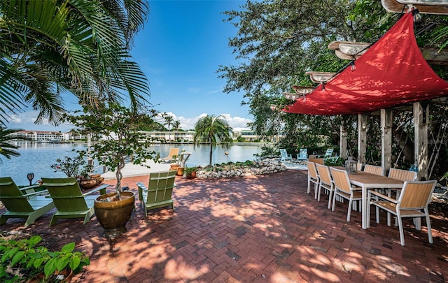 view of patio / terrace with a water view