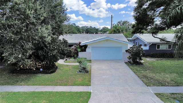 ranch-style house with a front lawn and a garage