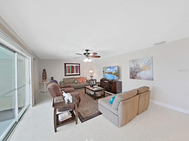 living room with ceiling fan