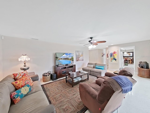 living room with ceiling fan