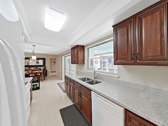 kitchen featuring pendant lighting, a chandelier, sink, white appliances, and ornamental molding