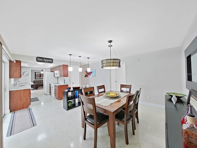 dining space featuring sink