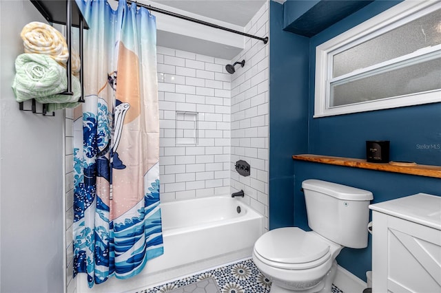 full bathroom with vanity, shower / bath combo with shower curtain, and toilet