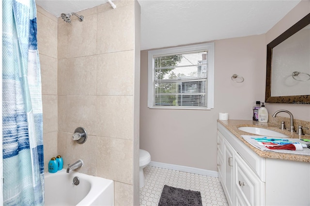 full bathroom featuring shower / tub combo, a textured ceiling, vanity, and toilet