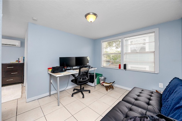 office featuring a textured ceiling, a wall mounted AC, and light tile patterned flooring