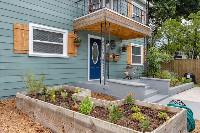 doorway to property with a balcony